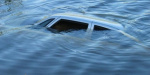 На Донетчине из водоема извлекли автомобиль с трупом