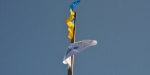 В Мариуполе подняли Олимпийский флаг