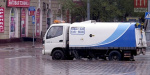 В Мариуполе коммунальщики в дождь решили вымыть  улицы