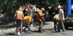 У мариупольского Главпочтамта ремонтируют дорогу
